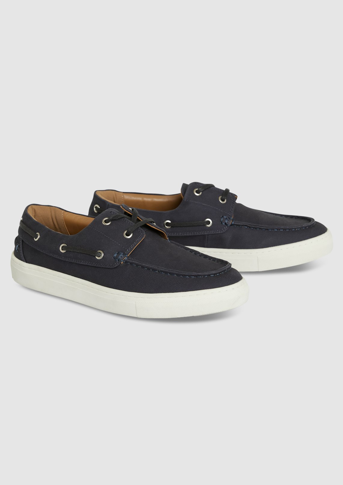 Do sperry canvas clearance shoes stretch